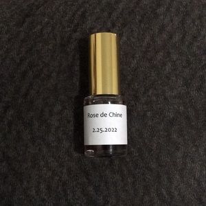 It is the original Tom Ford Rose de Chine in a glass bottle